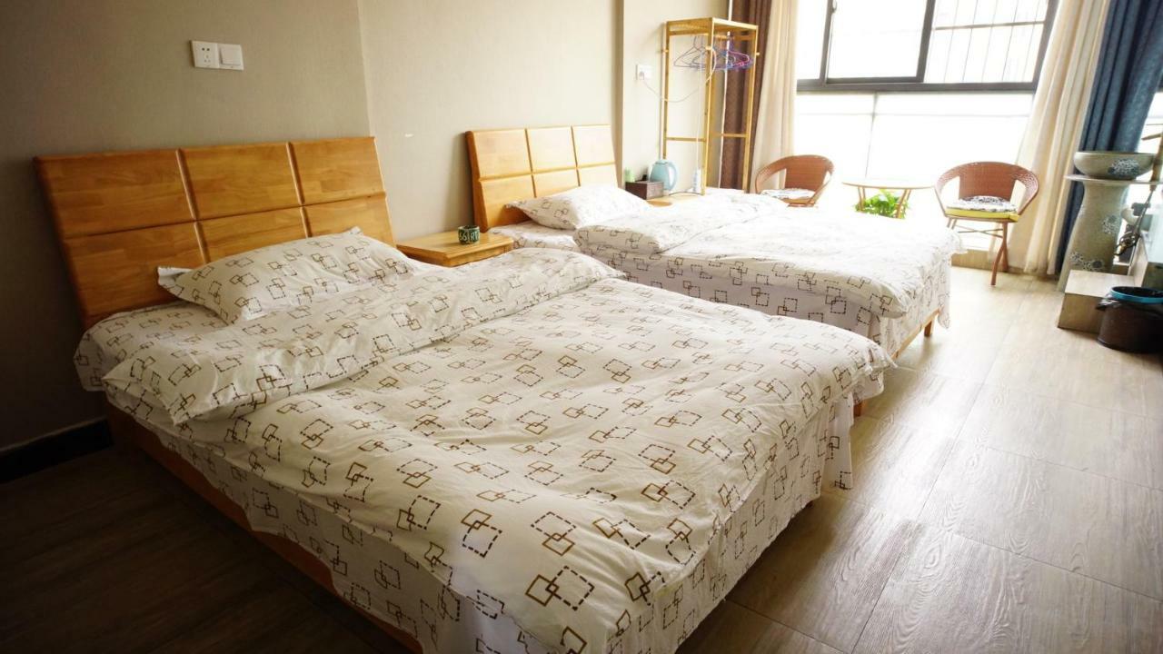 Huanlesong Youth Hostel Wuhan Zimmer foto